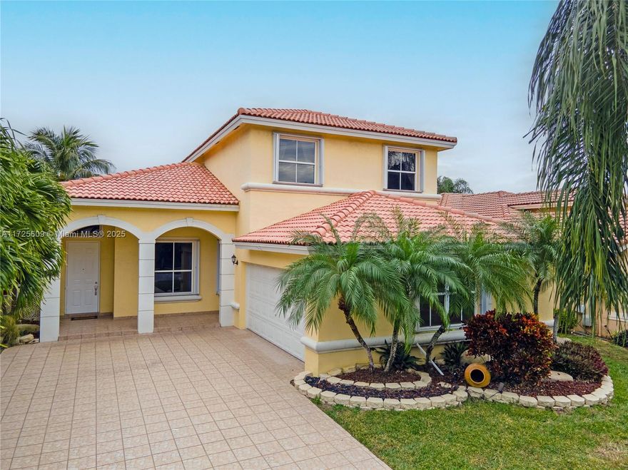 Welcome to your dream home in the highly desirable Coco Lakes community, located within walking distance to the beautiful Sabal Pines Park! This stunning 4-bedroom, 3-full-bath home offers the perfect blend of comfort, style, and functionality. The first-floor bedroom is ideal for guests or a home office. The spacious kitchen features stainless steel appliances, ample storage, and plenty of counter space. Large master suite, complete with en-suite bathroom that includes dual sinks, tub, and a walk-in shower. Step outside to your screened-in patio with a pool and serene views of a breathtaking 55-acre lake. This home also offers hurricane protection throughout, 2-car garage, a generous driveway for ample parking and much more!