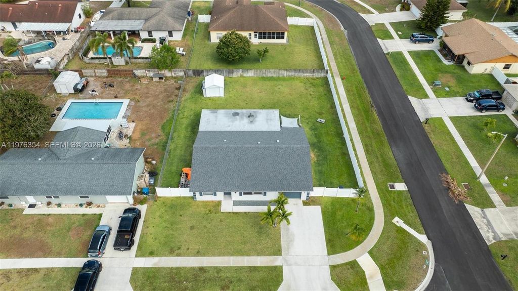 Photo of 141 Eider Ct, Royal Palm Beach, FL 33411 (MLS # A11976354)