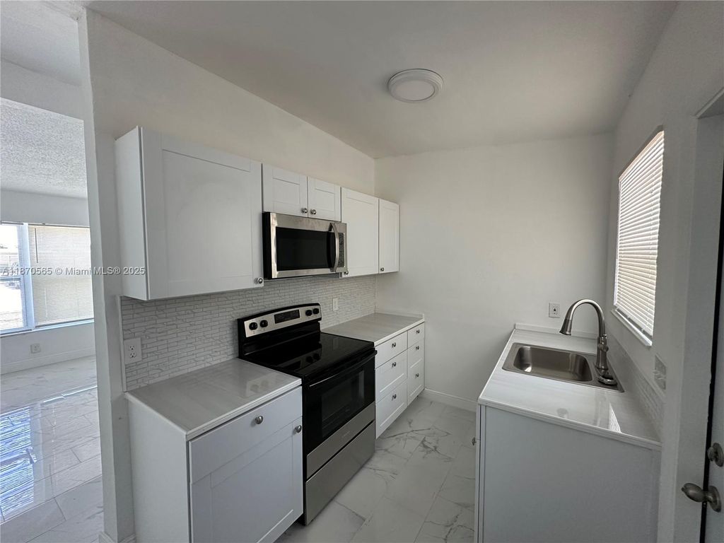 Photo of 240 NW 28th Ave, Boynton Beach, FL 33435 (MLS # A11870565)