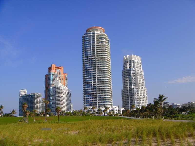 DIRECT OCEAN VIEWS FROM THIS SPACIOUS AND BRIGHT UNIT. PRIVATE FOYER, LARGE BALCONY, MARBLE FLOORS THROUGHT, VENETIAN PLASTER, UPDATED KITCHEN WITH LARGE WINE COOLER AND NEW APPLIANCES, ROMAN SHADES. CONTINUUM OFFERS BEACH & POOL SERVICE, 2 LAGOON POOLS, 3 TENNIS COURTS, GYM, SPA, LAP POOL, RESTAURANT, CONCIERGE, VALET PARKING AND SECURITY.