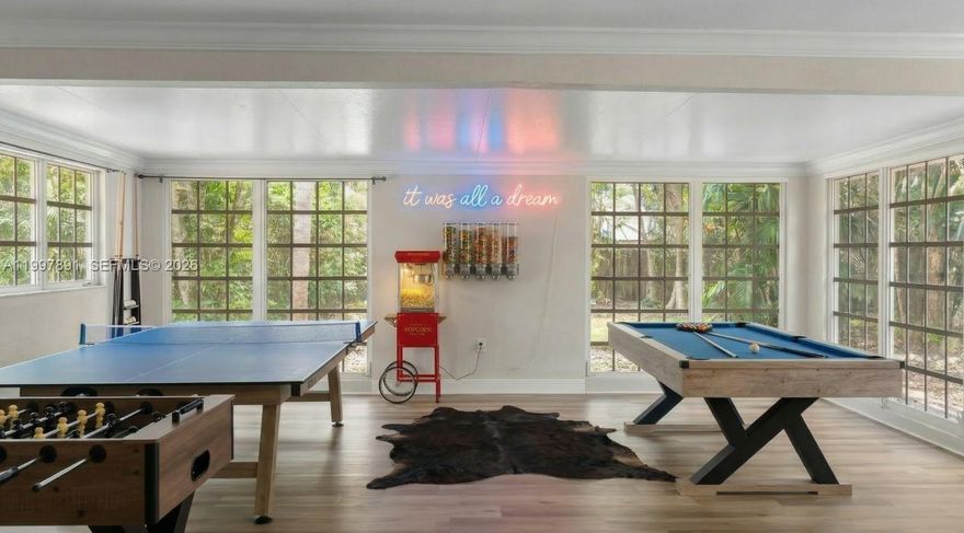 Welcome to your private resort in the heart of Oakland Park.
Set on an expansive double lot (nearly half an acre), this grand 5-bedroom, 3-bath estate offers over 4,000+ square feet of fully updated living, designed for both comfort and entertaining at scale. From the moment you enter, you’re met with space, flow, and intention. Featuring a formal dining room, dedicated office, and a massive game room that seamlessly connects to the outdoor oasis. The backyard is where this property truly separates itself: a resort-style heated pool and jacuzzi, lush tropical landscaping, pergola, putting green, tiki bar, bocce court, and multiple areas designed to host, unwind, and enjoy South Florida living at its finest.

The home is equipped with a brand-new roof (2024), updated bathrooms, new appliances, and is offered with chic furnishings for a true move-in-ready experience. Spacious bedroom layout offering flexibility for family, guests, or income-producing potential.

Located less than 10 minutes from the beach and moments from Oakland Park’s best restaurants, breweries, and shopping. This is the ideal primary residence, second home, or high-performing investment opportunity.

Space. Privacy. Income potential. This is the one.