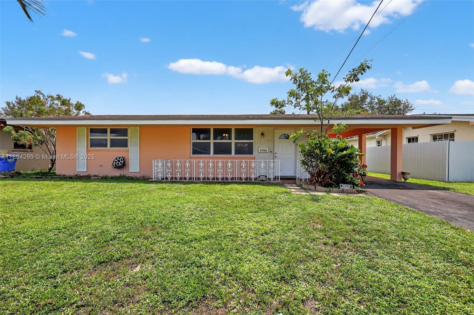 Move-In Ready Home with Fruit Trees & Endless Potential! Charming 2/1 single-family home in Pembroke Pines with impact windows, large lot and no HOA. Move-in ready with roof (8 yrs), A/C (11 yrs), new water heater, quartz kitchen countertops, renovated baths, and tile throughout. Features carport, laundry area, and plenty of room to expand or add a pool. Spacious yard is a gardener’s paradise with mango, avocado, and starfruit trees. Excellent location near shops, restaurants, and major highways.