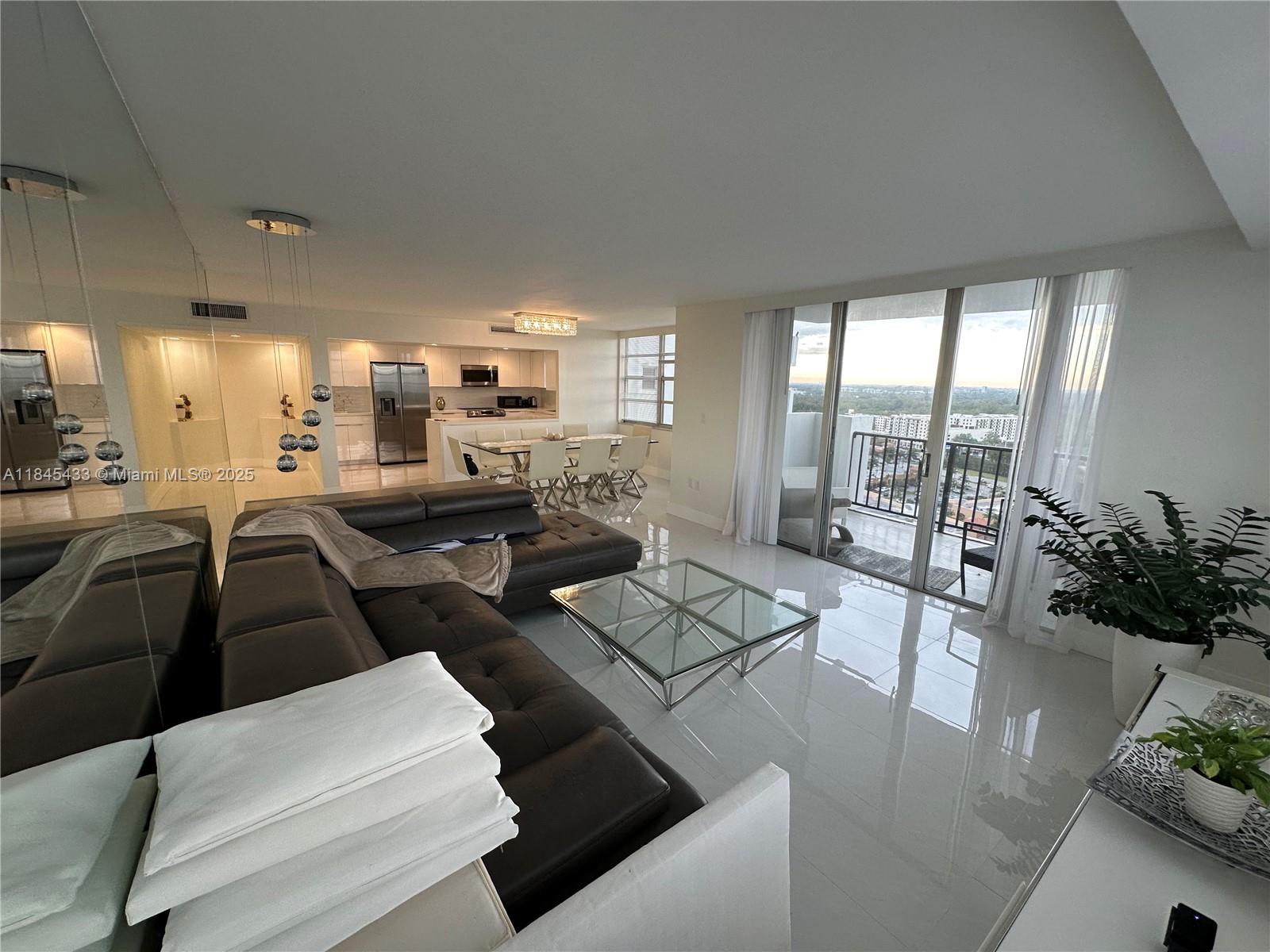COMPLETELY RENOVATED! STUNNING! LARGE 2 BEDROOM AND 2 FULL BATHROOM, PORCELAIN FLOOR THROUGHOUT, BRAND NEW OPEN PLAN KITCHEN WITH NEW APPLIANCES. CAN BE FURNISH OR UNFURNISHED LOCATED ON 22ND FLOOR WITH BEAUTIFUL SUNSET VIEWS FROM THE BALCONY. INTERNET AND CABLE IS INCLUDED IN THE . THE CONDOMINIUM HAS 2 SWIMMING POOLS, GYM, TENNIS COURT AND LAUNDRY ON EVERY FLOOR. COVERED ASSIGNED PARKING SPACE, AND BUILDING HAS A SECURITY BOOTH 24/7 + FRONT DESK WITH RECEPTIONIST TO CHECK VISITORS IN. PLENTY OF GUEST PARKING SPACE.