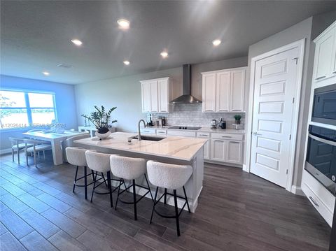 Tiny photo for 6489 NW Cloverdale Ave, Port St Lucie, FL 34987 (MLS # A12026414)