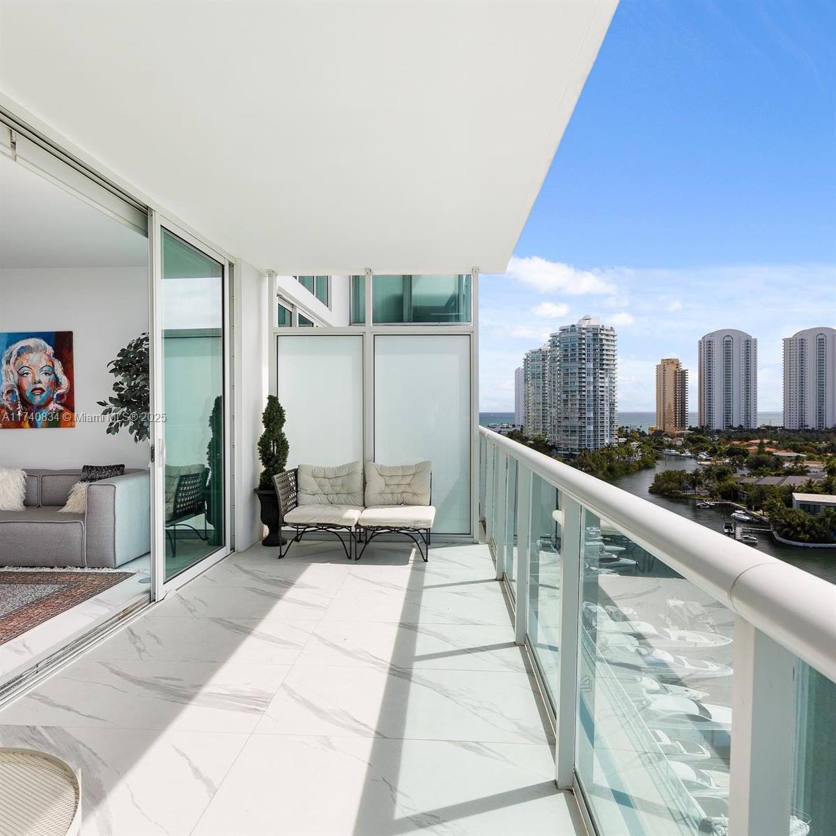 Experience breathtaking sunsets and panoramic views of the bay, Intracoastal, Oleta River State Park, and Haulover from this bright and spacious 3-bedroom residence. Fully furnished and move-in ready, this modern unit features an open floor plan with Italian cabinetry, stainless steel appliances, sleek white porcelain floors, and floor-to-ceiling windows that flood the space with natural light. The building offers a private marina with wet and dry dock options, as well as luxurious state-of-the-art amenities: a bayfront pool, spa with sauna and steam room, jacuzzi, resident lounge areas, cabanas, and a cafe bar. Two parking spaces are included-one assigned and one valet. A video tour is available upon request. Don?t miss this exceptional opportunity!