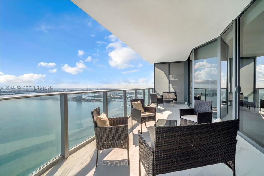 Reside above the bay. Residence 4501 is an expression of elevated waterfront living where light and endless panoramic views converge. Arrive via elevator into your exclusive foyer and step into a breathtaking corner residence wrapped in sweeping vistas of Biscayne Bay, the Atlantic Ocean, and Miami’s ever-evolving skyline. East-to-west exposure, this sky residence is illuminated from first light to sunset through dramatic 10-foot floor-to-ceiling glass.
TURN KEY - every detail has been curated for effortless luxury, including custom-built closets and motorized shades throughout. Designed with both grand entertaining and intimate everyday living in mind, the residence offers 4 bedroom suites, 5 full baths, a powder room, and a versatile den that creates a natural flow between private retreats and gathering spaces. A discreet staff suite with its own private entry provides added flexibility and separation. Open-concept kitchen appointed with Thermador appliances unfolds seamlessly into living/dining areas, all framed by extraordinary views. Privately positioned, the primary suite offers a tranquil escape set apart from the secondary bedrooms, creating the perfect balance of connection & retreat.
Expansive terrace extends the living experience outdoors, inviting sunrise coffees sunset cocktails. At Aria Reserve Miami, tropical landscapes weave throughout a spectacular amenity collection featuring resort-style pools with cabanas, spa, sauna, tennis, pickleball, basketball, etc.