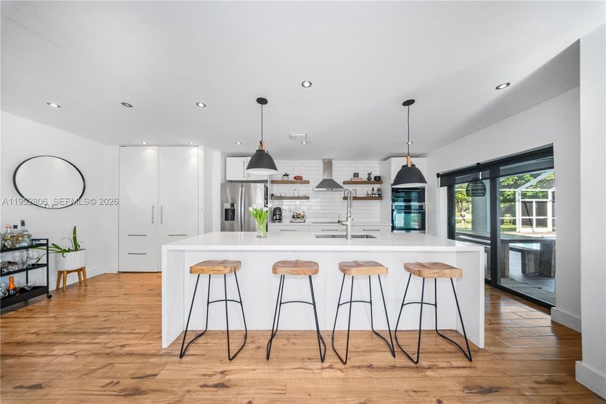 Escape to your own private waterfront paradise! This beautifully updated 3-bedroom, 2-bathroom home offers the perfect blend of luxury and tranquility in prestigious Palmetto Bay. Featuring a sparkling pool, direct water access, a metal roof, and impact windows throughout for ultimate protection and peace of mind. The home boasts modern updates throughout, a convenient 2-car garage, and the rare benefit of NO HOA fees - giving you complete freedom to enjoy your waterfront retreat. Located in one of South Florida's most sought-after areas, you'll be enjoying the peaceful, upscale atmosphere that Palmetto Bay is renowned for.