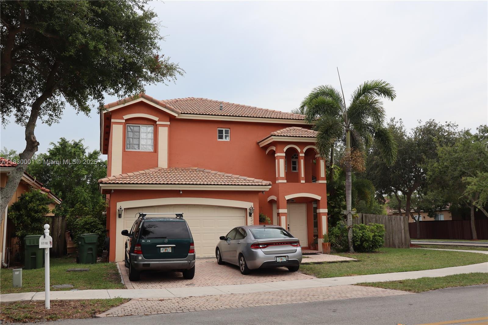 Beautiful 2-story corner-lot home with stunning lake view! Enjoy a spacious backyard with mango & plantain trees and a converted in-ground pool. Upstairs, the master suite is a true retreat, complete with a walk-in closet for her, a separate closet for him. Relaxing roman tub in the master bath. Two additional bedrooms share a full bath.
Elegant laminated wood flooring graces the staircase & second floor, while tile adds durability and style downstairs. The kitchen boasts a sleek peninsula design that opens to the cozy family room with direct access to the backyard. Open living, dining & foyer areas, complemented by a convenient half bath and accessible laundry area. Spacious 2-car garage. Seller offering $10,000 towards buyer’s closing costs or rate buy-down! Don’t miss this opportunity!