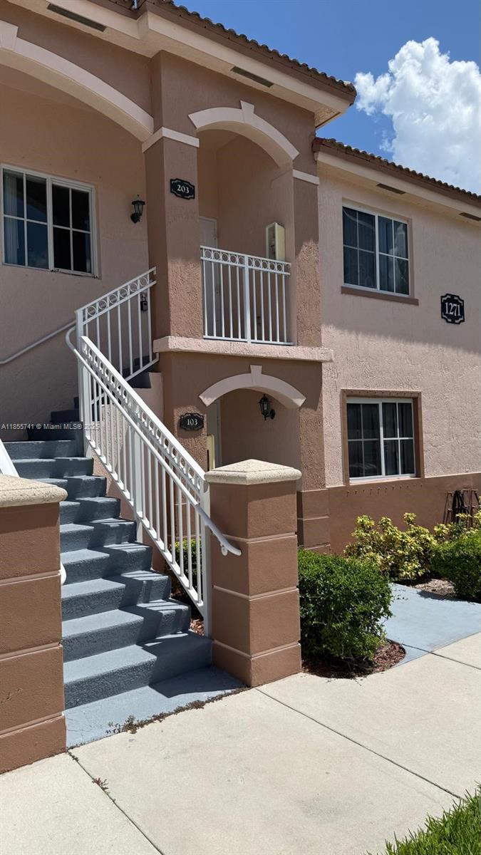 Beautiful 2 bedroom 2 bath condo located in the gated community of Venetia Gardens at the city of Homestead, Florida! Amenities include pool, playground, ample parking. Split floor plan with the master bedroom facing the lake view and the washer and dryer located inside the unit!