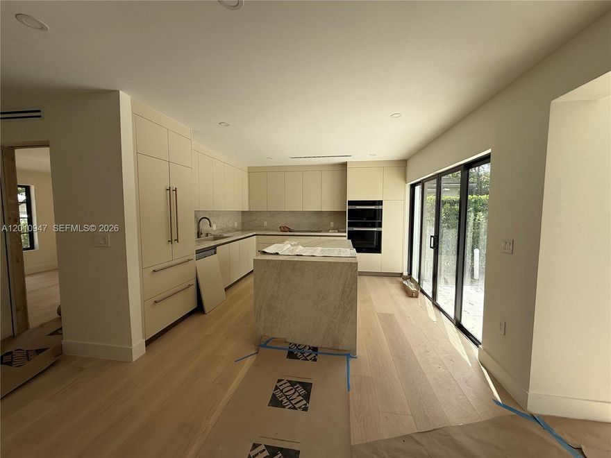 Coming soon in Coral Gables — a fully reimagined 3BR/3BA residence where every finish, fixture, and system is brand new. Taken to the studs and rebuilt with no detail overlooked. Open-concept kitchen featuring custom Febal Casa Italian cabinetry and a full suite of Miele appliances. Impact sliding glass doors open to a spacious backyard with a beautiful swimming pool — perfect for entertaining and outdoor living. Primary suite with oversized walk-in shower and custom Febal Casa closets throughout. Just minutes from the Loews Coral Gables Hotel and The Plaza Coral Gables, home to some of the city's best dining, and walking distance to the shops and restaurants of Miracle Mile. Turn-key luxury in one of South Florida's most desirable neighborhoods.