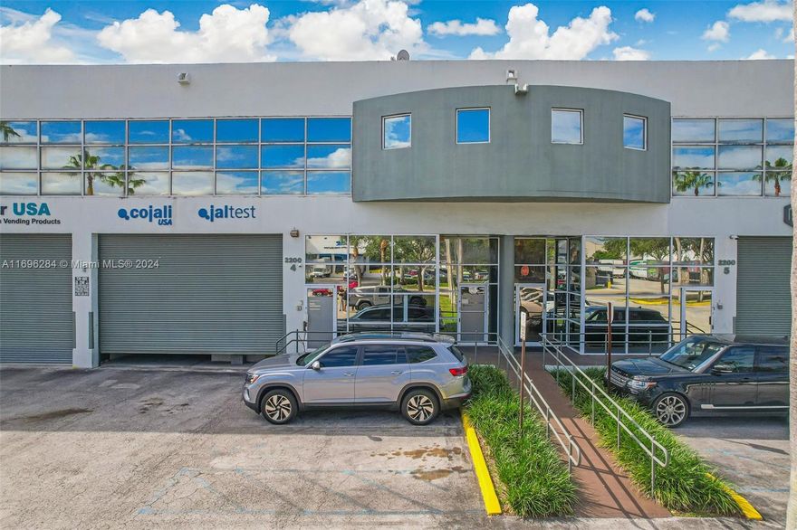 Prime Location in Doral! 5,550 SF Property. Exceptional luxury office space with warehouse in highly sought-after Doral area. This property offers 9 offices (4 on the first floor and 5 on the second), a reception area, kitchen, 2 bathrooms and hallway. Features include a Twin-T concrete roof, 24-foot ceilings, 9 dedicated parking spaces, and a warehouse with a dock-high door with remote access, loading dock, drive in truck access for convenient loading and unloading and heavy-duty metal racks, 220 volts. Roof replacement, scheduled by the association for early 2025 and owner has already paid. Conveniently situated just minutes from the Turnpike and Palmetto Expressway. A must-see to fully appreciate!