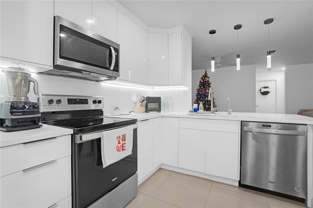 Photo of 11211 W Atlantic Blvd #106, Coral Springs, FL 33071 (MLS # A11924908)