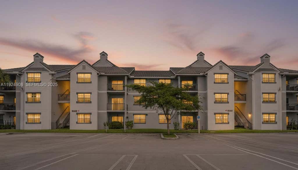 Photo of 11211 W Atlantic Blvd #106, Coral Springs, FL 33071 (MLS # A11924908)
