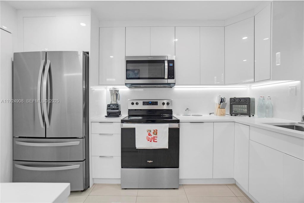 Photo of 11211 W Atlantic Blvd #106, Coral Springs, FL 33071 (MLS # A11924908)