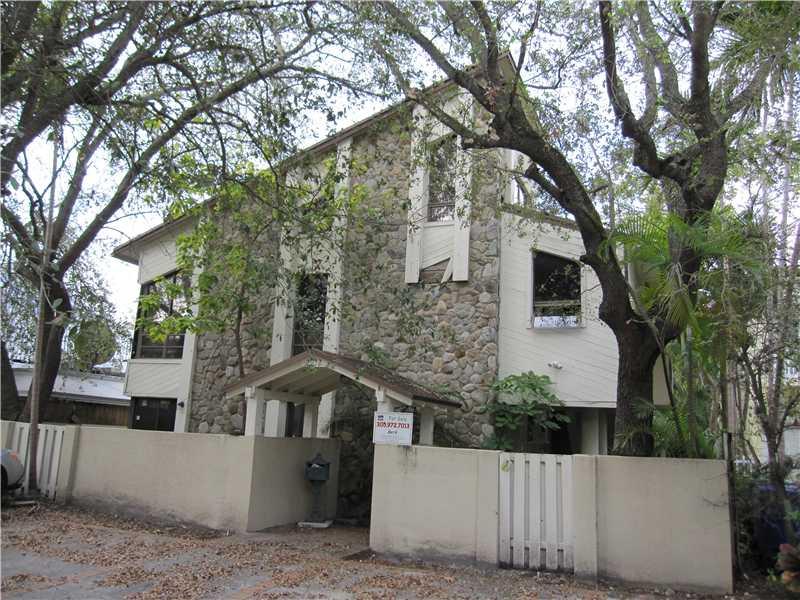 Coconut Grove second floor spacious condo. Three bedrooms, two full baths plus a loft overlooking the living room. Vaulted ceilings. Formal dining room. Nice size balcony. Spacious master bedroom. Lots of closet space. Tile floors in the living, dining a nd kitchen. Two car off street parking spaces in the front. Walking distance to Downtown Coconut Grove, shopping, movies and other local stores. Inside the unit and common areas need cosmetic work. Part of a two unit condo association. Excellent price!!
