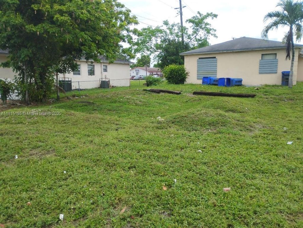 Photo of 1351 NW 27th Ave, Fort Lauderdale, FL 33311 (MLS # A11815195)