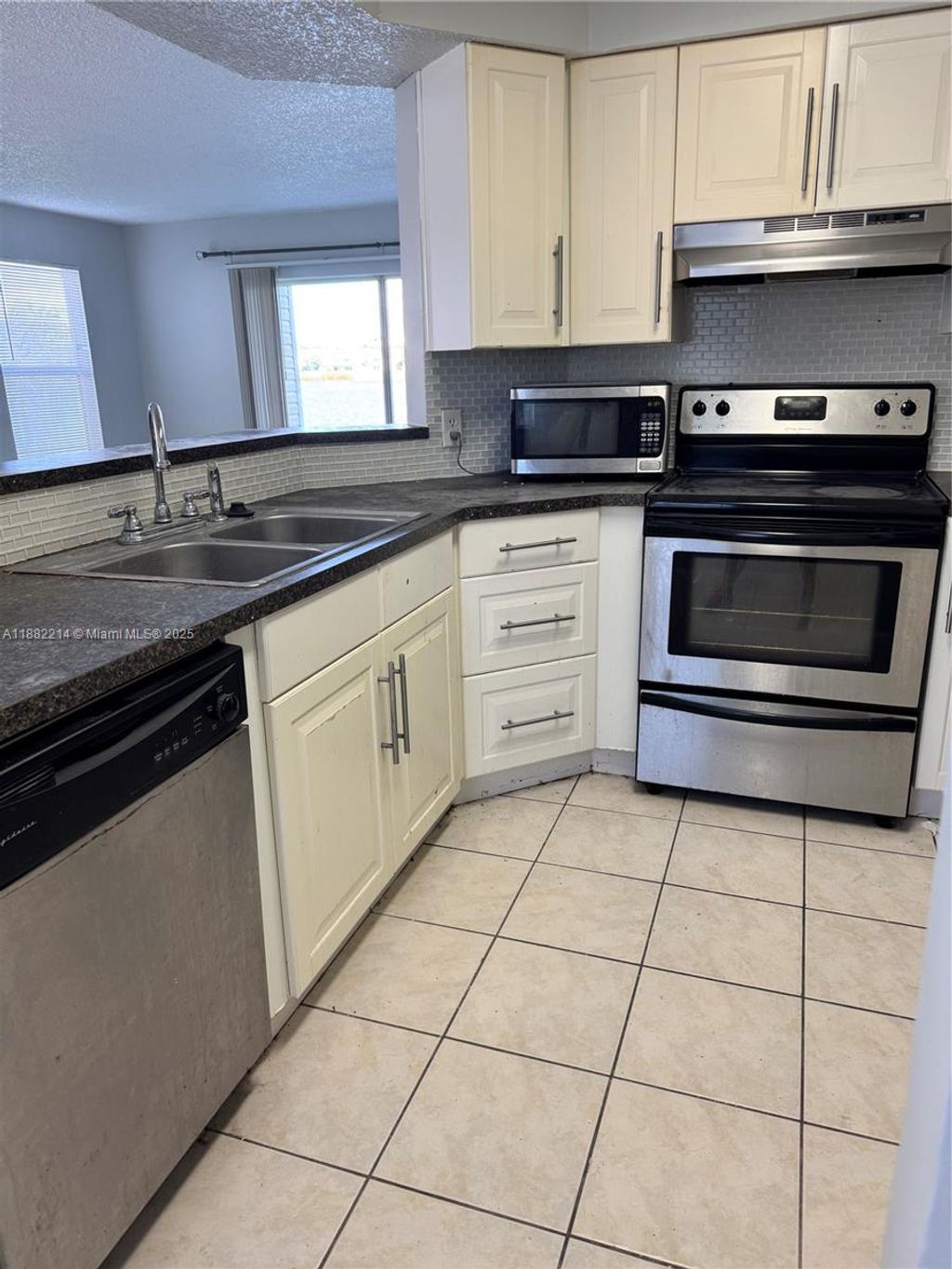 Photo of 3405 NW 44th St #101, Oakland Park, FL 33309 (MLS # A11882214)