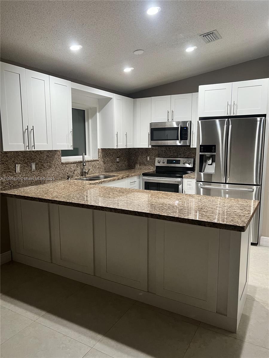 This beautifully remodeled home offers the perfect blend of comfort and convenience. Enjoy impact doors and windows for noise reduction and energy efficiency, plus a key-less entry for easy access. Stay secure with 5 exterior cameras, a Ring doorbell, and ADT readiness.
Inside, you'll find direct internet connections in every room, ensuring reliable WiFi throughout the home. The Closet Factory closets in all bedrooms and the laundry area provide ample storage, while the remodeled kitchen and bathrooms feature stainless steel appliances. Alexa-controlled lighting and TV wall mounts in every room add to the home's modern appeal.
Relax outside on the covered patio or store your extra belongings in the outside shed. Freshly painted and ready to move in!