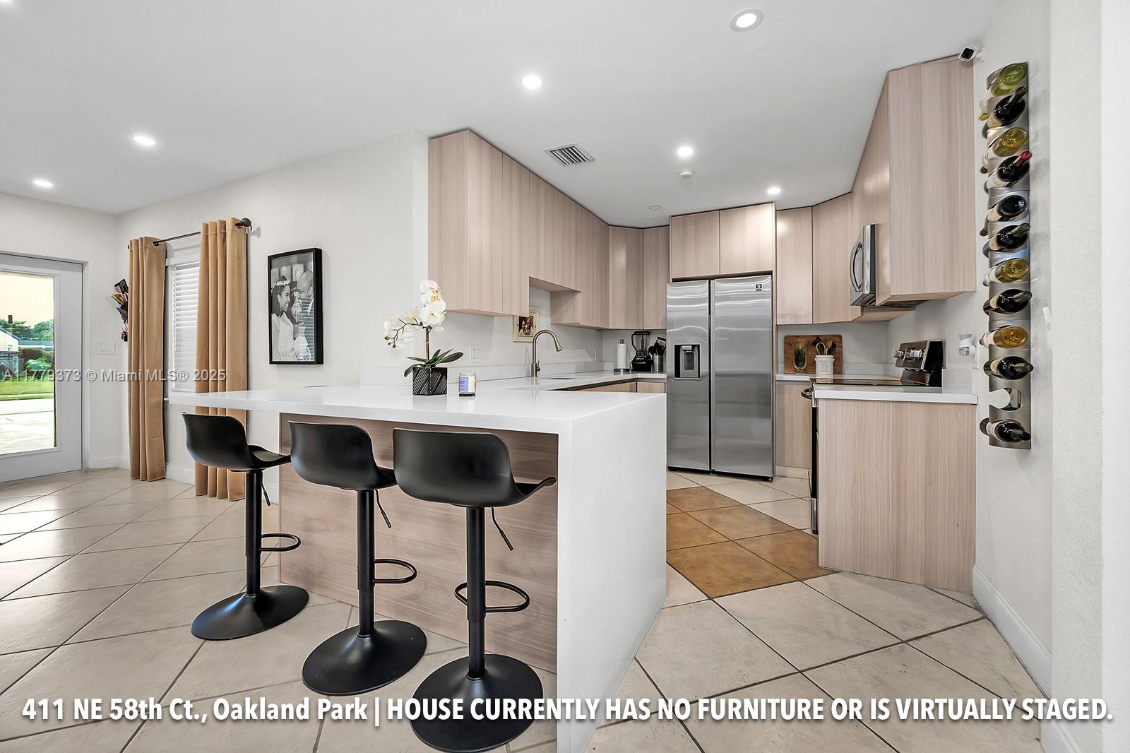 Property for Sale at 411 Ne 58th Ct, Oakland Park, Miami-Dade County, Florida - Bedrooms: 3 
Bathrooms: 4  - $510,000