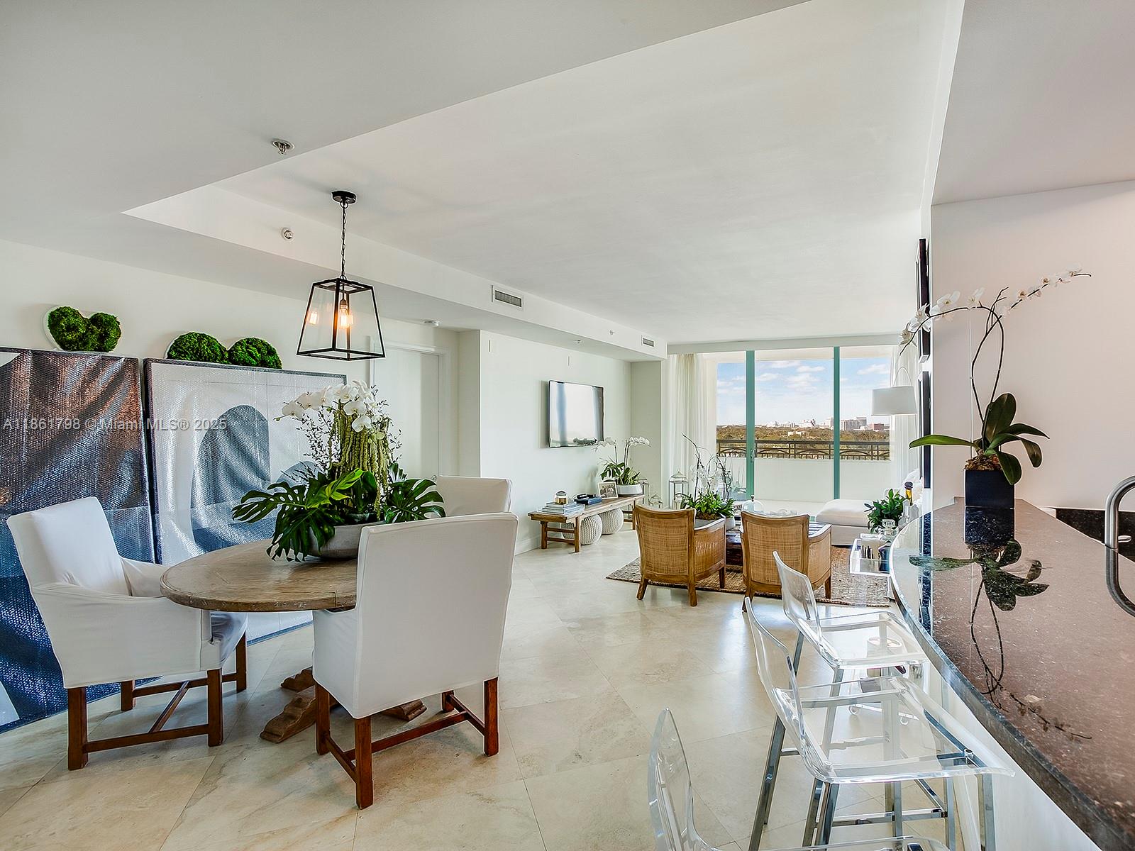 Exquisite, highly sought-after corner unit within the Ritz Carlton Tower Residences. This elegant residence features 2Br/2Ba, along with 1,540 sf of luxurious design & details, including a desirable split floor plan, two separate balconies, marble floors, sophisticated closet system plus a covered parking space. Owner benefit from the five star amenities: swimming pools, fitness center, room service, beautiful salon & complimentary valet.