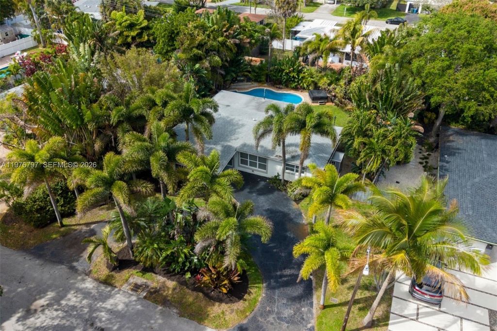 Photo of 1577 NE 48th Ct, Oakland Park, FL 33334 (MLS # A11976797)