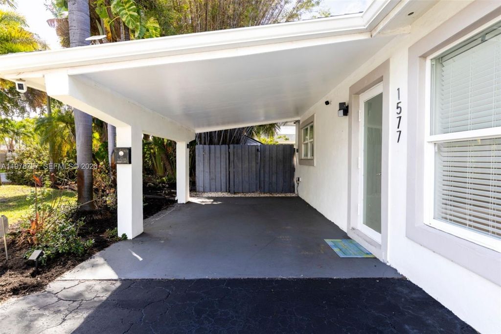 Photo of 1577 NE 48th Ct, Oakland Park, FL 33334 (MLS # A11976797)