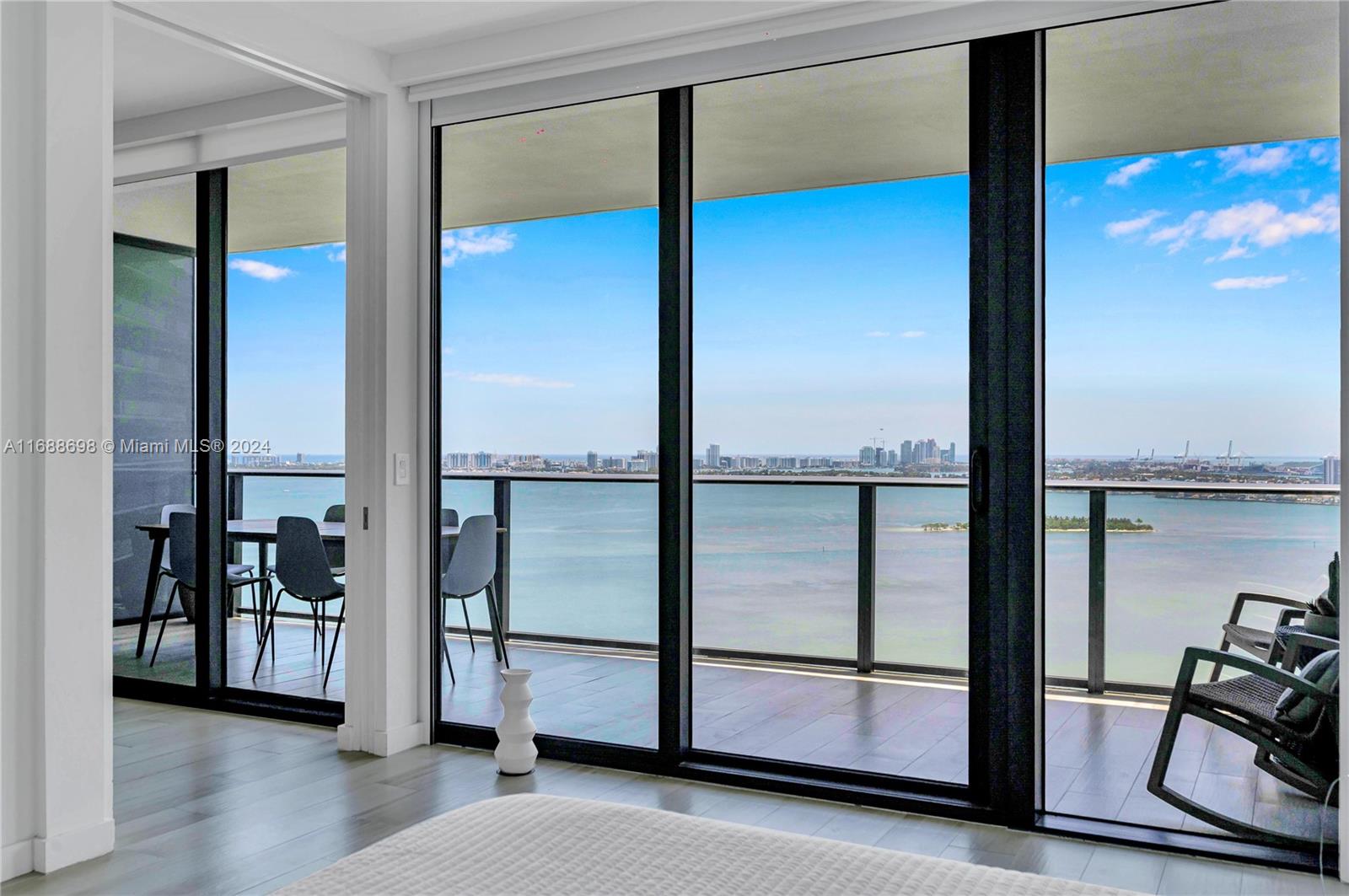Welcome to the exclusive Paraiso Bay. This spacious 2 bedroom, 3 bathroom condo offers panoramic views of Biscayne Bay and the Miami skyline. The open living area flows seamlessly onto a large private balcony.
Enjoy the modern kitchen with premium Italian cabinetry, Bosch appliances, and quartz countertops. The master suite boasts floor-to-ceiling windows, walk-in closet, and spa-inspired bathroom with a soaking tub and dual vanities.
Paraiso Bay offers resort-style amenities, including a lagoon-style pool, spa, state-of-the-art fitness center, tennis courts, movie theater, and a private beach club with waterfront dining by renowned chef Michael Schwartz. Enjoy the best of Edgewater’s dining, shopping, and entertainment just minutes from your doorstep, with easy access to Midtown