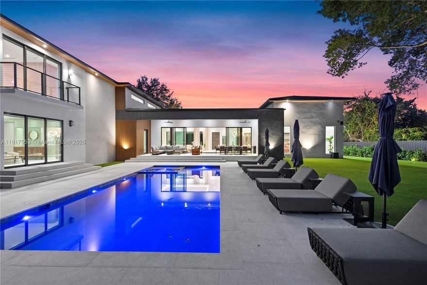 Villa Ruby boasts 9 bedrooms and 9 bathrooms, where luxury seamlessly blends with comfort. The open-concept design creates expansive living spaces filled with natural light, showcasing stylish finishes and modern decor. Step outside to discover a large backyard that serves as a private oasis, featuring a stunning pool framed by beautiful landscaping. Perfect for hosting summer barbecues or enjoying serene evenings under the stars, this outdoor space is a true retreat. Available for seasonal rental and move-in ready.