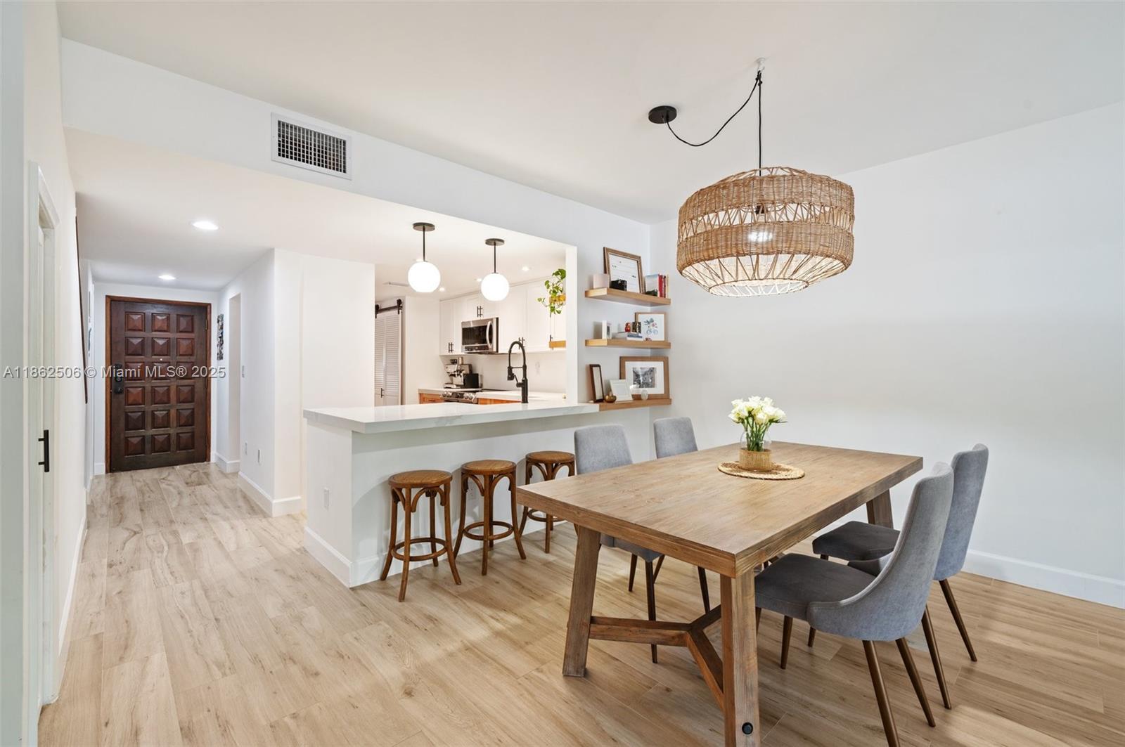 Located in the heart of Coral Gables, this beautifully remodeled townhome blends modern comfort with elegance. Offering 1,515 sqft, it features 2 spacious bedrooms, 2.5 bathrooms, and an open layout ideal for both living and entertaining. The remodeled kitchen, upgraded bathrooms, and wood flooring elevate the home's bright and inviting living spaces. The primary bedroom includes a walk-in closet, while the property boasts a charming entrance and covered porch. Additional features include a new AC, water heater, 3 parking spaces, and extra storage. Just minutes from Coral Gables finest shops, restaurants, and parks, the building offers a pool and BBQ area perfect for outdoor gatherings. Enjoy the ideal mix of urban convenience and suburban tranquility. Don’t miss out on this stunning home!