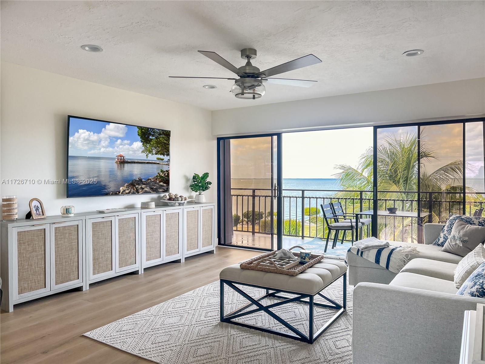 Unparalleled waterfront living with open bay views at this gorgeous Tamarind Bay Club Unit. This incredible 2 bedroom 2 bathroom unit has water views from every room and the best sunset viewing from your private patio. This fully furnished unit has stainless steel appliances and a full sized washer and dryer tucked away for convenience with plenty of storage.
Dock your boat (up to 34ft) with ease thanks to an assigned slip and enjoy direct bay access and nearby ocean access via Adams Cut. The community offers two heated pools, tennis and pickleball courts, a boat washing station, trailer storage, a sunset gazebo, and a commercial ice machine for your convenience.