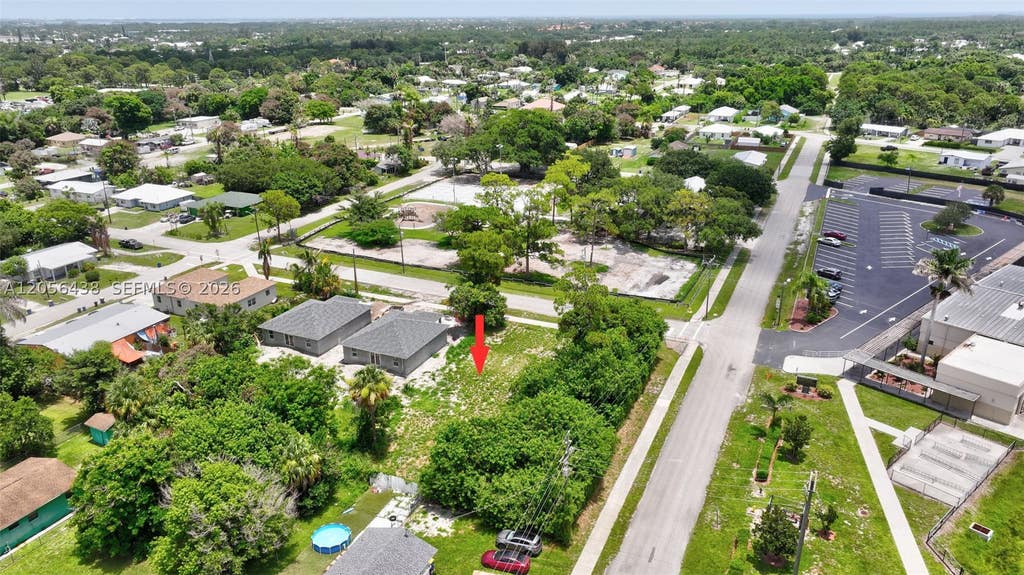 Photo of 5684 SE 45th Ave, Stuart, FL 34997 (MLS # A12056438)