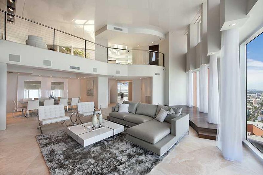 The Portofino Penthouse is the Pinnacle of Penthouse Living! This state-of-the art Sky Home has it all: nearly 6,000sq.ft,       5 bathrooms, 4 bedrooms, 3 levels, 2 parking spaces, & 1 Rooftop Pool. Every finish, fixture, appliance & electronic system is  custom & brand new. Soaring high above its South of Fifth Neighbors,  this residence offers 360 degree views of the Ocean, South Beach & Miami Skyline. Private Elevator, Security System & floor-to-ceiling height windows complete this Portofino Penthouse.