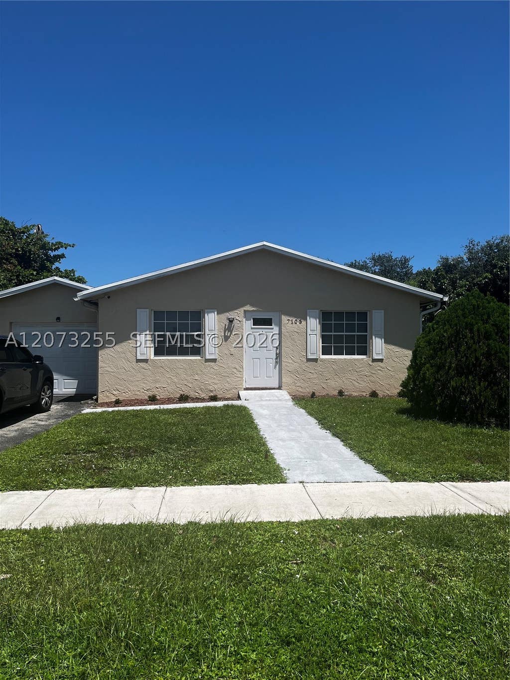 Photo of 7103 SW 3rd Ct, North Lauderdale, FL 33068 (MLS # A12073255)