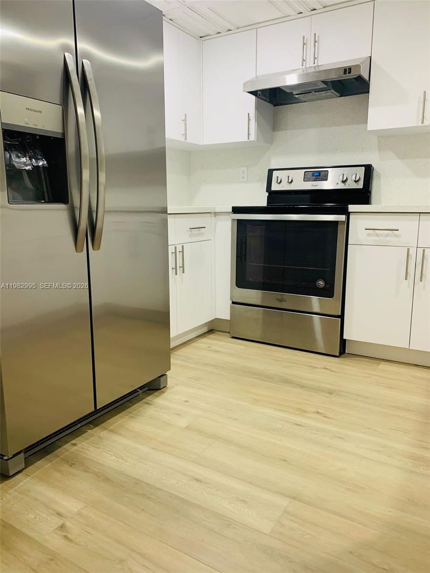 Newly Remodeled Townhouse in Excellent Location! Spectacular 2 Story townhouse. New floors, New kitchen & New Master Bath & 1/2 Bath downstairs. Minutes from FIU, Dolphin Mall, Expressways. Private patio, 2 parking spaces, washer & dryer inside unit. A must see, will not last.