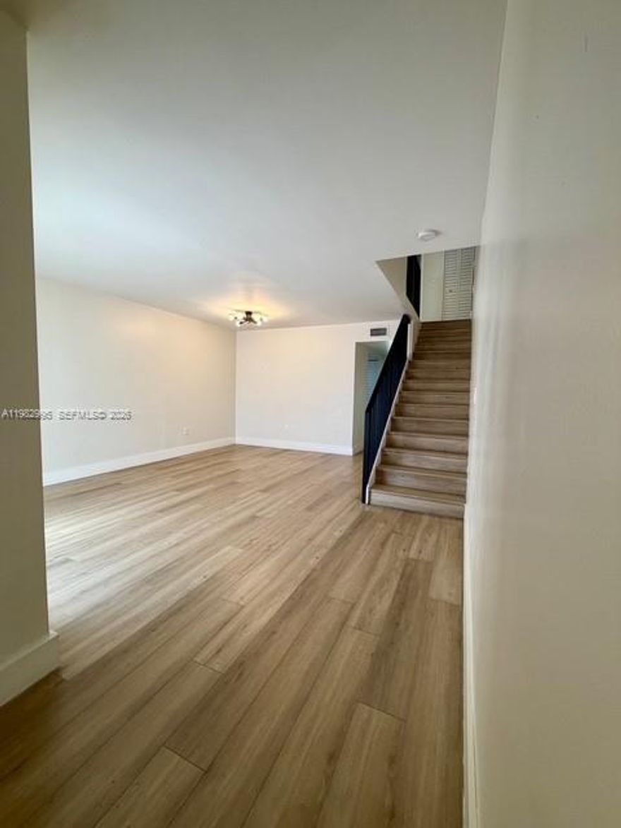 Newly Remodeled Townhouse in Excellent Location! Spectacular 2 Story townhouse. New floors, New kitchen & New Master Bath & 1/2 Bath downstairs. Minutes from FIU, Dolphin Mall, Expressways. Private patio, 2 parking spaces, washer & dryer inside unit. A must see, will not last.