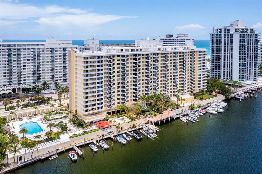 Welcome to your dream residence! This expansive corner unit boasts 1,660 sq. ft. under A/C, offering breathtaking water views from every angle. The bright and airy apartment features one assigned parking space and an exclusive cabana right by the pool. Enjoy top-notch amenities, including a state-of-the-art gym and a stylish billiard room. Boating enthusiasts will appreciate the available boat docks through the condo association, making this a boater's paradise. Don't miss the chance to call this extraordinary