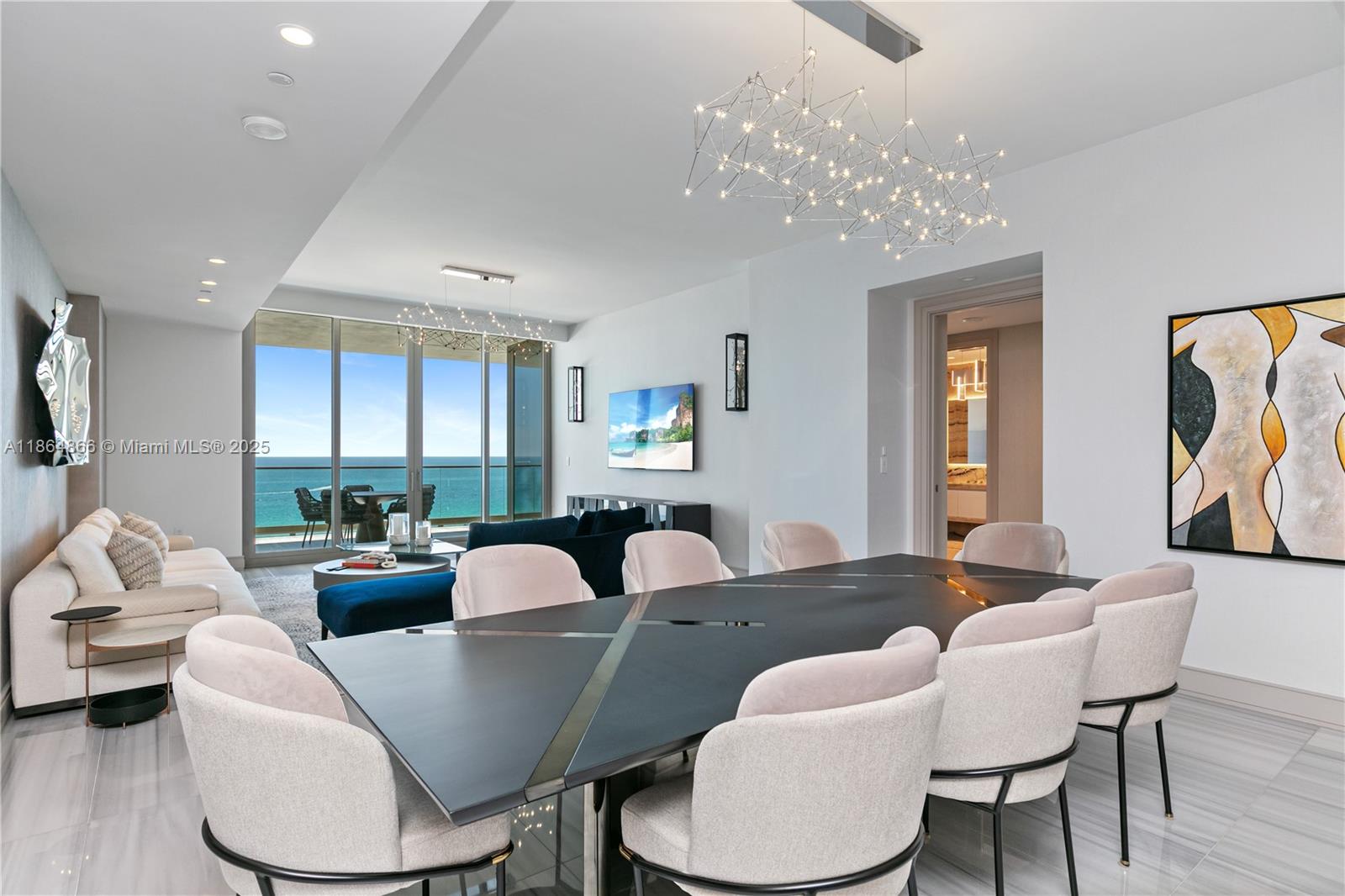 Spectacular flow through layout with 4 bedrooms plus den. This plush residence features home automation, marble floors, luxurious wall coverings, onyx primary bathroom with steam shower, chef's kitchen with La Cornue gas range, two terraces complete with grill and many other appliances. Luxury furniture from Casa Fendi is included.
World-Class amenities featuring Rolls Royce house car, state of the art spa and fitness facilities, daily breakfast, cinema, F1 and golf simulators, cigar lounge, bowling, skating rink, trading room and tech lounge. Three pools with a Flow Rider and a waterslide. Five restaurants: Avra, IL Mulino and KeUh with pool and beach dining by Meze and Costa Grill.