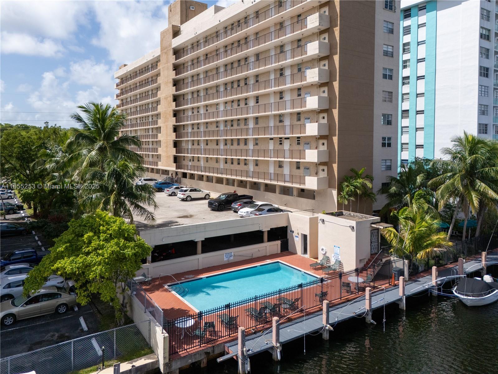 Bright 2-bedroom, 1.5-bathroom unit with a partial view of the water canal and Oleta Park greenery. The renovated kitchen features quartz countertops, a bar top, and newer appliances. The master bedroom has a sliding door leading to a balcony, perfect for watching the spectacular sunsets. Conveniently located near the famous Sunny Isles Beach, great restaurants, and a nearby mall. The building amenities includes a pool, gym, BBQ area, and a club room. 1 assigned parking space. *The building is currently undergoing renovations, which will increase the property value upon completion.