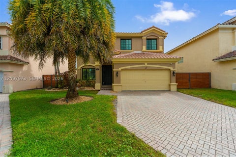 Photo of 2001 NW 99th Ter, Pembroke Pines, FL 33024 (MLS # A12097073)