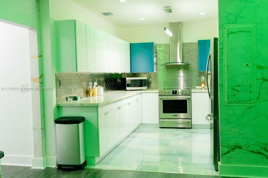 This property is a Two-story remodeled flex warehouse consisting of six offices, conference room and a kitchen. There is a full bathroom on the second floor and half bath on the first and a welcoming reception area with a large open space on the first floor. The building is currently being used as a recording/video studio, as well as an office space with 3 seprate offcies and a confrence room. Building has updated electric 110/220V, multiple HVAC systems and fiberoptic cabling. Sold with studio operating equipment; furniture is negotiable.