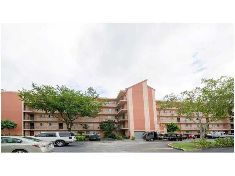 Beautiful lake view from 2/2 in Lakeshore! Unit features ceramic tile floors, redone master bath (granite, glass shower, etc), screened patio and so much more. Can be rented immediately. Make us an offer today!