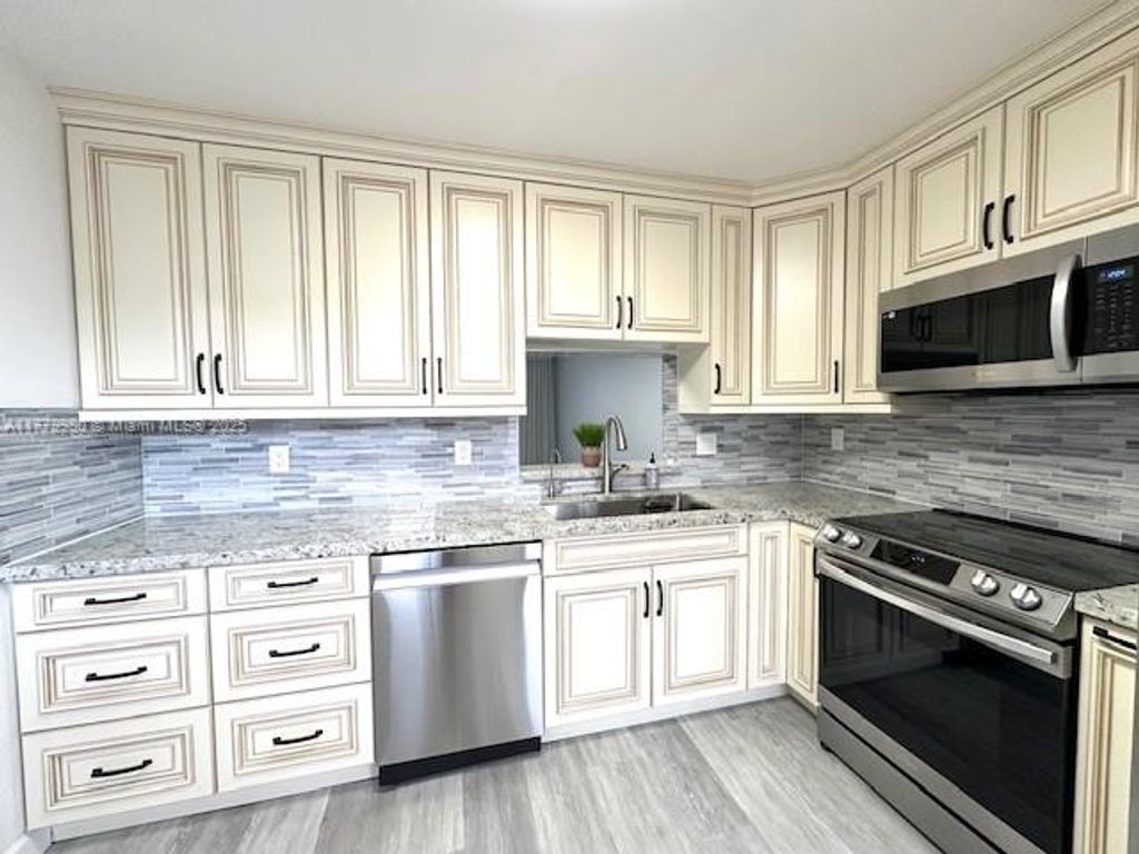 Photo of 301 NE 14th Ave #401, Hallandale Beach, FL 33009 (MLS # A11779980)