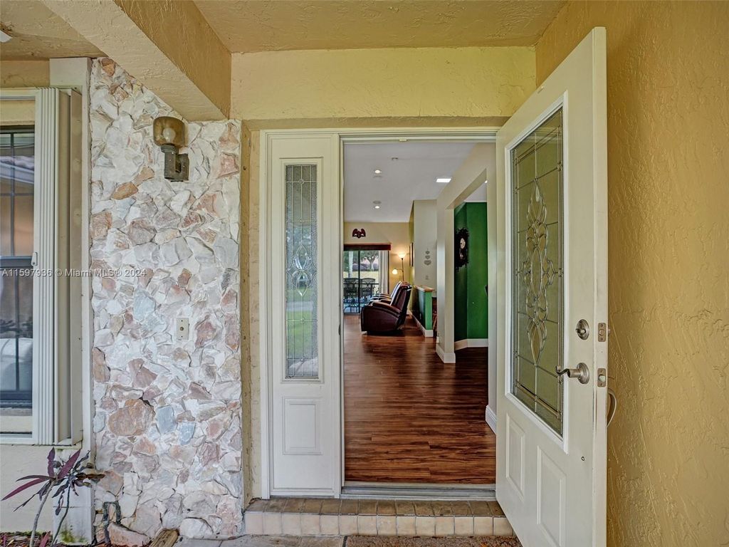 Photo of 4830 NW 92nd Ter, Coral Springs, FL 33067 (MLS # A11597936)