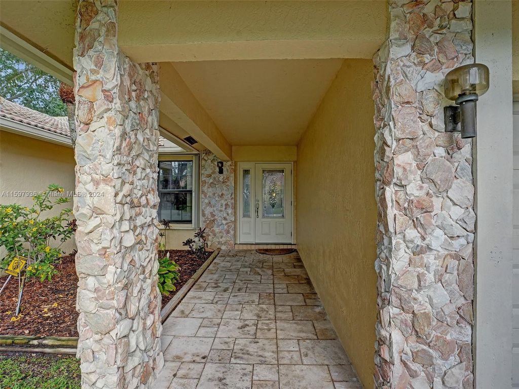 Photo of 4830 NW 92nd Ter, Coral Springs, FL 33067 (MLS # A11597936)