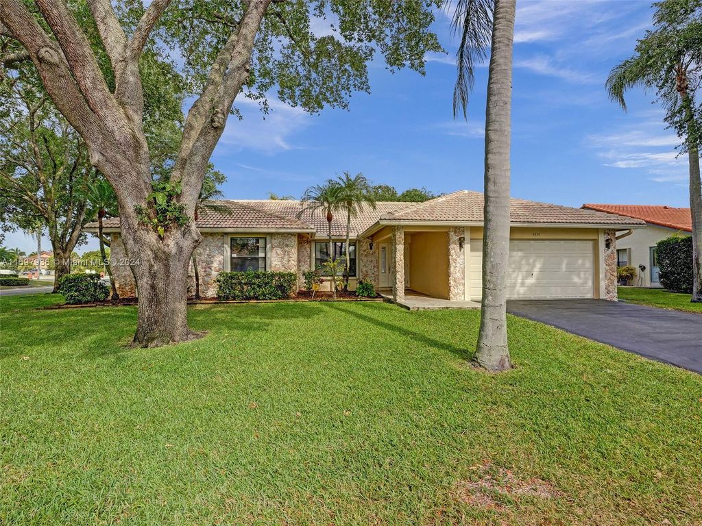 Photo of 4830 NW 92nd Ter, Coral Springs, FL 33067 (MLS # A11597936)