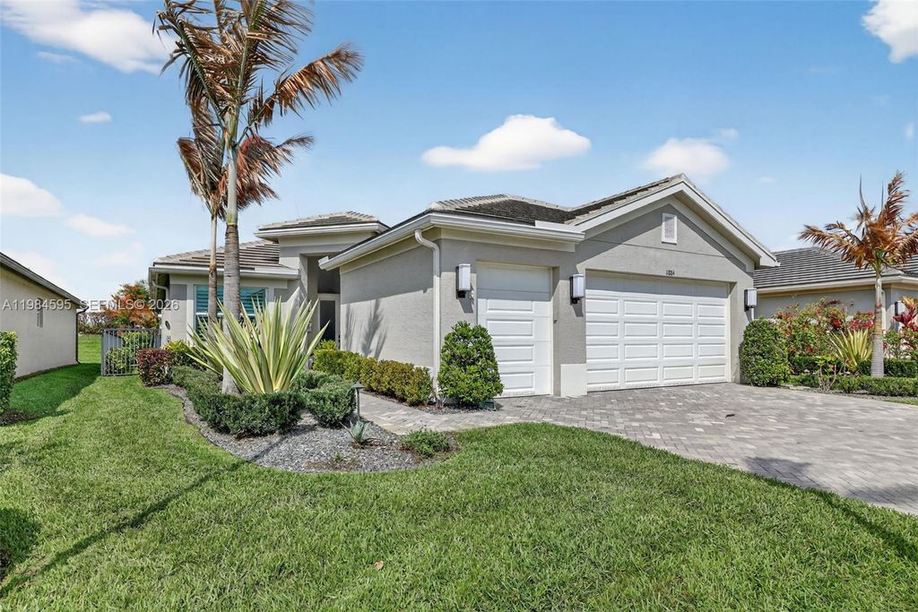 Photo of 11884 SW Paradise River Rd, Port St Lucie, FL 34987 (MLS # A11984595)
