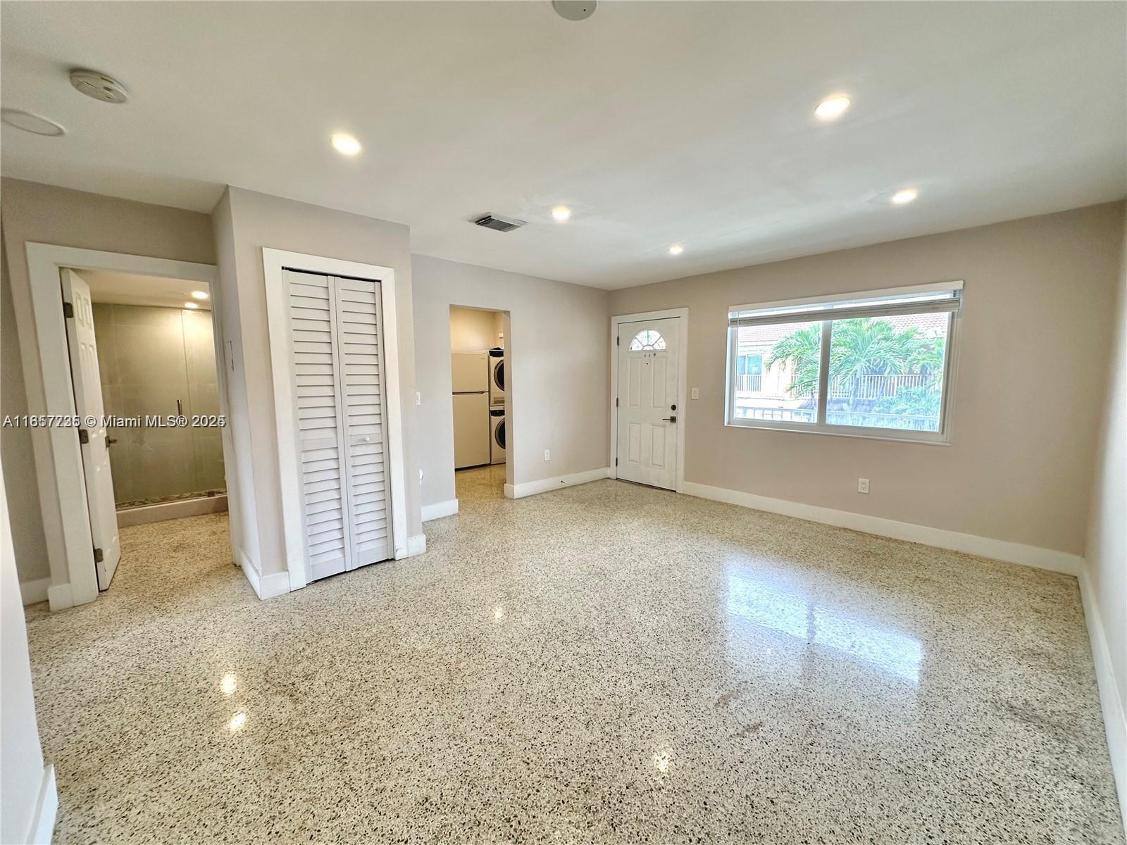 Fully Remodeled 2 Bed / 1 Bath apartment located in the heart of Hialeah. This modern second-floor unit shows open-concept living with terrazzo floors, new recessed lighting and a custom bathroom. This corner unit also displays a new eat-in kitchen complete with quartz countertops & all SS appliances. The unit offers 1 parking Space, an in-unit washer/dryer, and is protected by all Impact Doors & Windows. Easy to Show!