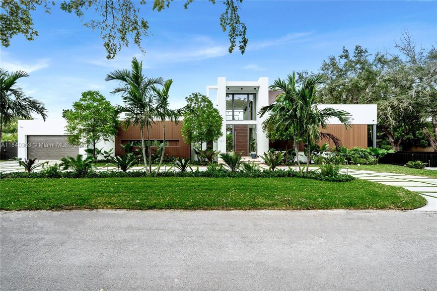 TURNKEY BRAND NEW TROPICAL MODERN ONE STORY ESTATE ON A HUGE CORNER LOT NESTLED IN LUSH LANDSCAPING IN BISCAYNE PARK! 14,958 SF CORNER LOT w/New 5,448 Total SF Home. Double Height Grand Salon w/15FT Ceilings. Living & Dining Areas w/Custom Bar & TV Lounge. European Oak Italkraft Chef's Kitchen w/Taj Mahal Quartzite Island, Wolf & Sub Zero Appliances. Primary Suite opens to Pool + Walk-in Closets + Bath w/dual shower + double vanity sink. Outdoor Area w/Heated Pool & Pergola w/Summer Kitchen. 1,860 SF Rooftop Terrace to keep or create Additional Primary Suite! European Oak Floors, Lutron Lighting + Sonos Surround Sound & Linear Diffusors t/o. Parking for 6+ Cars. Located in the Safest Neighborhood Biscayne Park w/24HR Security Patrol. Near Prestigious Miami Country Day School.