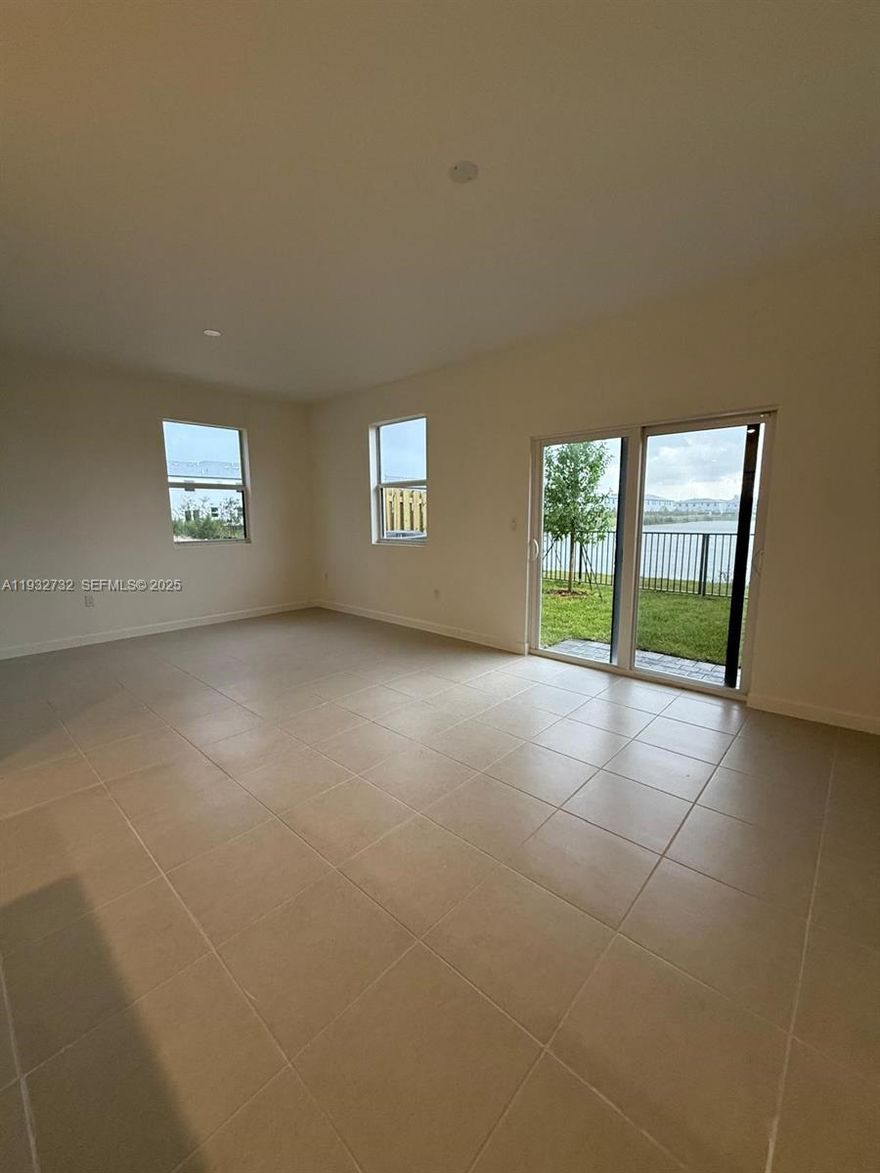 Lake Front 2025 built new townhome ! Offering 3 bedrooms, 2.5 bathrooms, beautiful lake view , fenced backyard, community offers resort style amenities including a lake front clubhouse