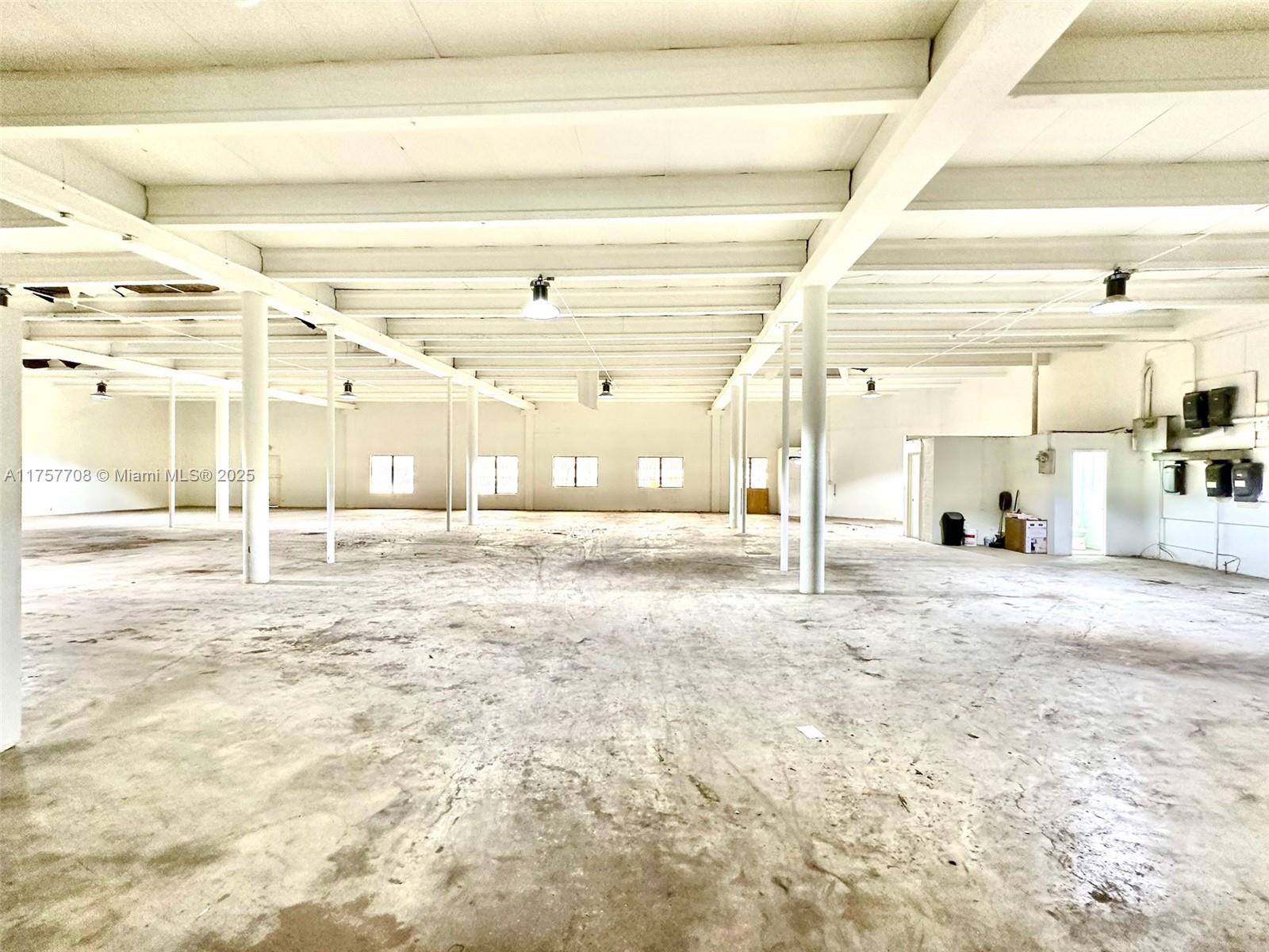 Related ISG is excited to offer the opportunity to lease this 12,765 SF stand-alone flex space warehouse, featuring 15-foot high ceilings and dual roll-up doors. Situated on a prime corner lot in Allapattah, the property offers excellent visibility and convenient access via NW 29th Street, directly connecting to the vibrant Wynwood district. This central location boasts significant exposure, with the added benefit of a reduced rental rate compared to neighboring areas. The property includes secure, gated private parking and flexible zoning, allowing for a variety of uses ranging from light industrial to retail. This triple net (NNN) lease requires a minimum term of three (3) years, with CAM charges estimated at $5.50 per square foot. The space is vacant and available for immediate viewing.